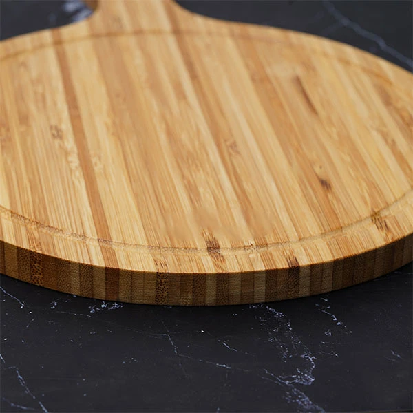 Thớt tre hình tròn có tay cầm 40x30x1.5cm