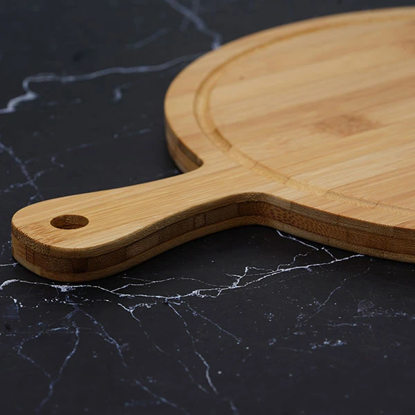 Thớt tre hình tròn có tay cầm 40x30x1.5cm